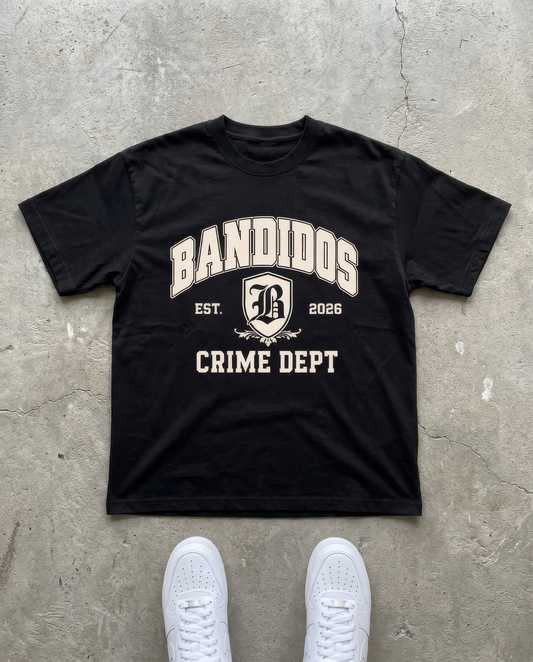 BANDIDOS CRIME DEPT TEE – BLACK laid flat on concrete